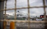 A view shows the multi-million-dollar mega yacht Scheherazade (Rear C), docked at the Tuscan port of Marina di Carrara, Tuscany, on May 6, 2022, after its basin was reflooded (Federico Scoppa/AFP)