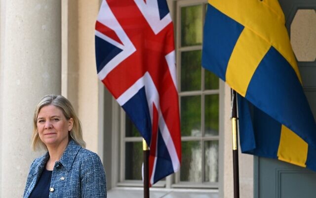 Sweden's Prime Minister Magdalena Andersson stands next to the British and the Swedish flags as she waits for the arrival of British Prime Minister Boris Johnson for talks in Harpsund, 120 kilometers west of Stockholm, Sweden on May 11, 2022. (Jonathan Nackstrand/AFP) Sweden's Prime Minister Magdalena Andersson stands next to the British and the Swedish flags as she waits for the arrival of British Prime Minister Boris Johnson for talks in Harpsund, 120 kilometers west of Stockholm, Sweden on May 11, 2022. (Jonathan Nackstrand/AFP)