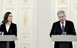 This file photo taken on February 24, 2022 shows Finland's President Sauli Niinistö (R) and Finland's Prime Minister Sanna Marin addressing a press conference on Russia's invasion of Ukraine in Helsinki, Finland (Markku Ulander / Lehtikuva / AFP)