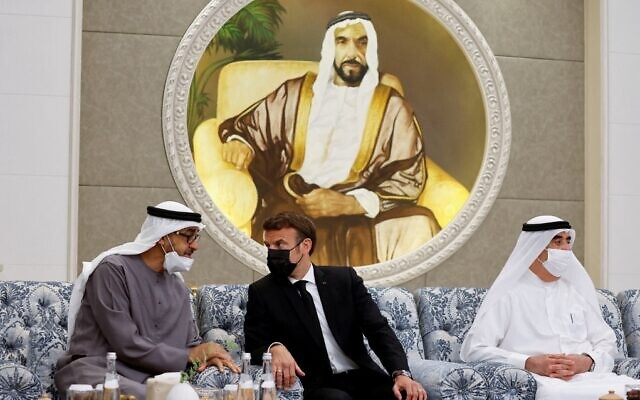 French President Emmanuel Macron (C) meets the UAE's newly elected president, Sheikh Mohammed bin Zayed Al Nahyan (L), at Al Mushrif Palace in Abu Dhabi, United Arab Emirates, on May 15, 2022. (Christian Hartmann/Pool/AFP) French President Emmanuel Macron (C) meets the UAE's newly elected president, Sheikh Mohammed bin Zayed Al Nahyan (L), at Al Mushrif Palace in Abu Dhabi, United Arab Emirates, on May 15, 2022. (Christian Hartmann/Pool/AFP)