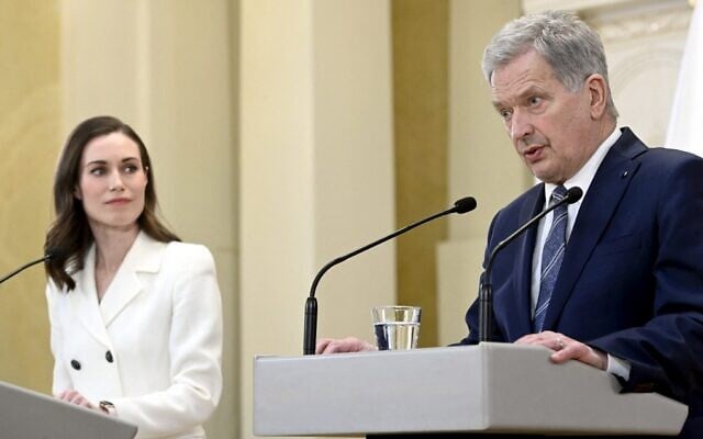 Finnish Prime Minister Sanna Marin (L) and President Sauli Niinistö give a press conference to announce that Finland will apply for NATO membership at the Presidential Palace in Helsinki, May 15, 2022. (Heikki Saukkomaa/Lehtikuva/AFP) Finnish Prime Minister Sanna Marin (L) and President Sauli Niinistö give a press conference to announce that Finland will apply for NATO membership at the Presidential Palace in Helsinki, May 15, 2022. (Heikki Saukkomaa/Lehtikuva/AFP)