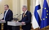 Finland's Minister of Defense Antti Kaikkonen (left) and Finland's Foreign Minister Pekka Haavisto give a press conference to announce that Finland will apply for NATO membership, at the Presidential Palace in Helsinki, Finland, May 15, 2022. (Heikki Saukkomaa/Lehtikuva/AFP)