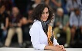 Arab-Israeli director Maha Haj poses during a photocall for the film "Mediterranean Fever" at the 75th Cannes Film Festival in Cannes, southern France, on May 25, 2022. (PATRICIA DE MELO MOREIRA / AFP)