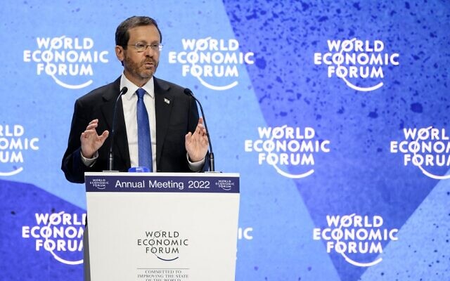 President Isaac Herzog addresses the assembly during the World Economic Forum annual meeting in Davos, on May 25, 2022. (Fabrice Coffrini/AFP) President Isaac Herzog addresses the assembly during the World Economic Forum annual meeting in Davos, on May 25, 2022. (Fabrice Coffrini/AFP)