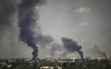 Smoke and dirt rise from the city of Severodonetsk, during shelling in the eastern Ukrainian region of Donbas, on May 30 2022, amid Russia's military invasion launched on Ukraine. (Aris Messinis/AFP)