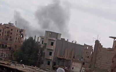 Smoke rises after an alleged air strike in eastern Syria, on May 7, 2022. (Social media)