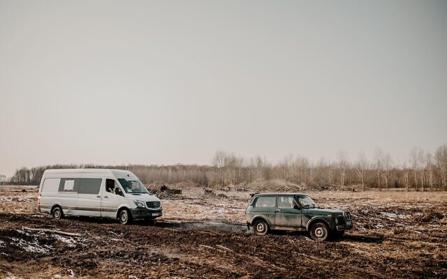 The rescue convoy from Yaroslavka, Ukraine, was forced to travel through muddy fields as the roads were occupied by Russian soldiers, March 20, 2022. (Klara Lisinski/ Dorcas Kauffman)
