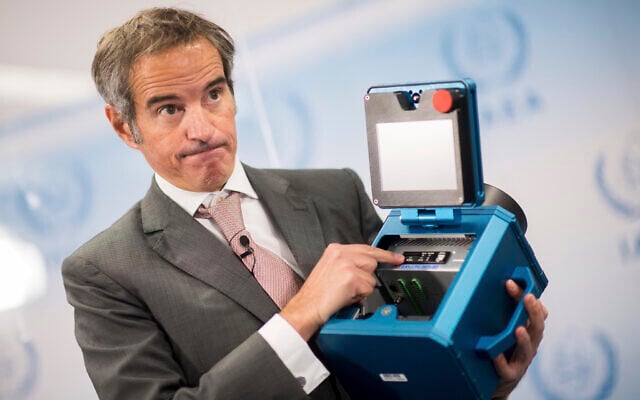 Director General of the International Atomic Energy Agency, IAEA, Rafael Mariano Grossi shows the inner of a case of an IAEA monitoring device during a press conference in Vienna, Austria, December 17, 2021. (AP/Michael Gruber) Director General of the International Atomic Energy Agency, IAEA, Rafael Mariano Grossi shows the inner of a case of an IAEA monitoring device during a press conference in Vienna, Austria, December 17, 2021. (AP/Michael Gruber)