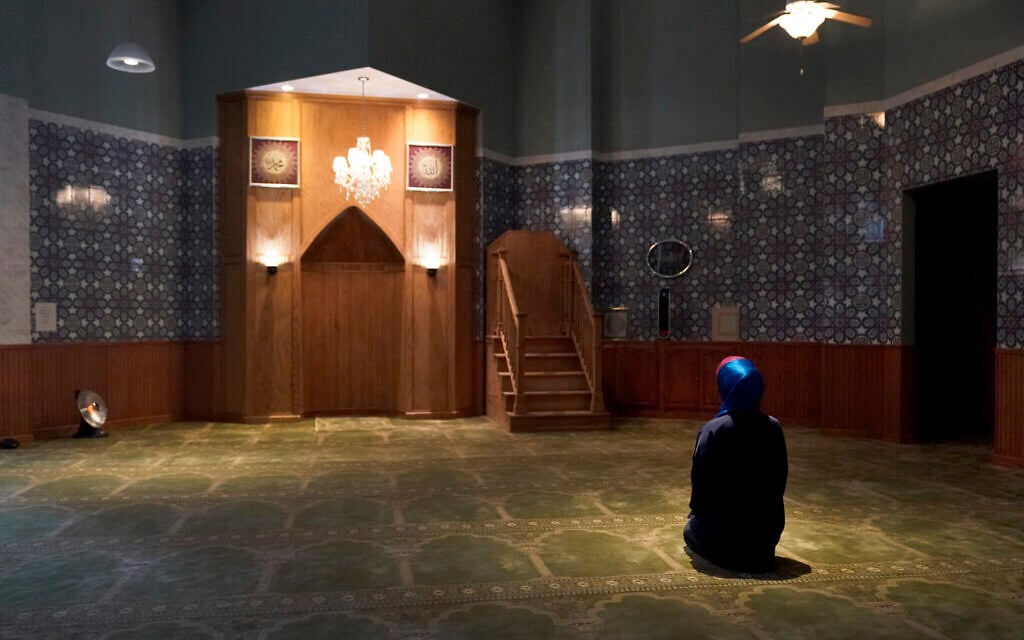 Madinah Javed sits in a prayer room at the American Islamic College in Chicago for her afternoon prayer, January 27, 2022. (AP/Charles Rex Arbogast) Madinah Javed sits in a prayer room at the American Islamic College in Chicago for her afternoon prayer, January 27, 2022. (AP/Charles Rex Arbogast)