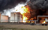 A view of the site of fire at an oil depot in Belgorod region, Russia, April 1, 2022. (Russian Emergency Ministry Press Service via AP)