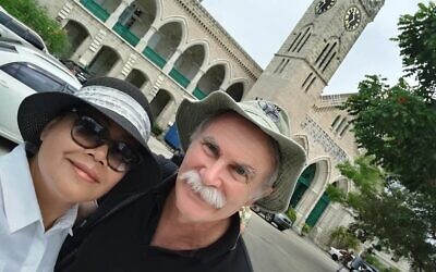 This undated photo provided by the Fitton family shows Jim Fitton with his wife Sarijah. (Fitton family via AP)