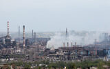 Smoke rises from the Metallurgical Combine Azovstal in Mariupol, in territory under the government of the Donetsk People's Republic, eastern in Mariupol, Ukraine, May 5, 2022. (AP Photo)