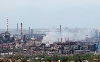 Smoke rises from the Metallurgical Combine Azovstal in Mariupol, in territory under the government of the Donetsk People's Republic, eastern in Mariupol, Ukraine, May 5, 2022. (AP Photo)