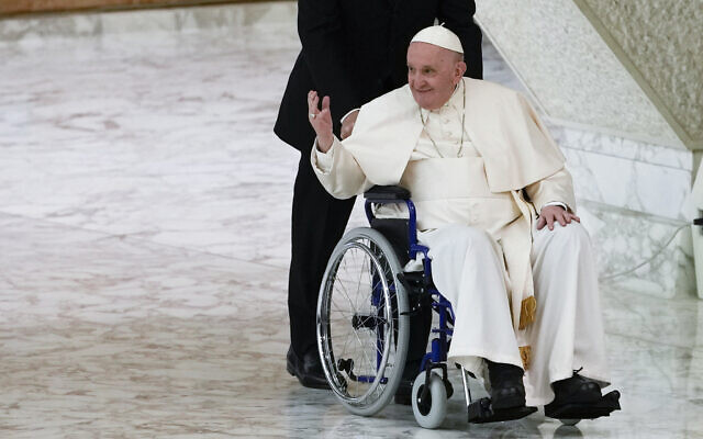 Pope Francis arrives in a wheelchair to attend an audience with nuns and religious superiors in the Paul VI Hall at The Vatican, May 5, 2022. (AP Photo/ Alessandra Tarantino, File) Pope Francis arrives in a wheelchair to attend an audience with nuns and religious superiors in the Paul VI Hall at The Vatican, May 5, 2022. (AP Photo/ Alessandra Tarantino, File)