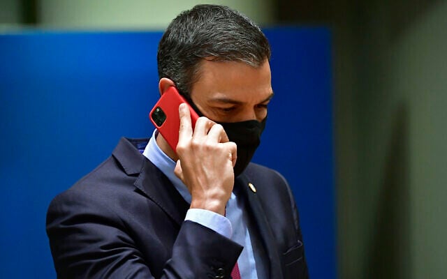 Spain's Prime Minister Pedro Sanchez speaks on his cell phone during a round table meeting at an EU summit in Brussels, on July 20, 2020. (John Thys, Pool Photo via AP, File) Spain's Prime Minister Pedro Sanchez speaks on his cell phone during a round table meeting at an EU summit in Brussels, on July 20, 2020. (John Thys, Pool Photo via AP, File)