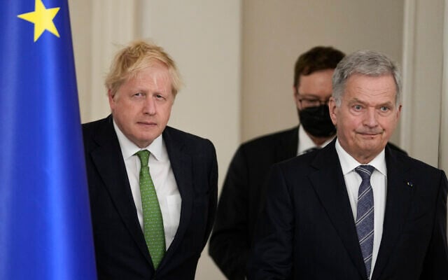 British Prime Minister Boris Johnson, left, and Finland's President Sauli Niinisto arrive to meet the media, at the Presidential Palace in Helsinki, Finland, May 11, 2022. (AP Photo/Frank Augstein, Pool) British Prime Minister Boris Johnson, left, and Finland's President Sauli Niinisto arrive to meet the media, at the Presidential Palace in Helsinki, Finland, May 11, 2022. (AP Photo/Frank Augstein, Pool)