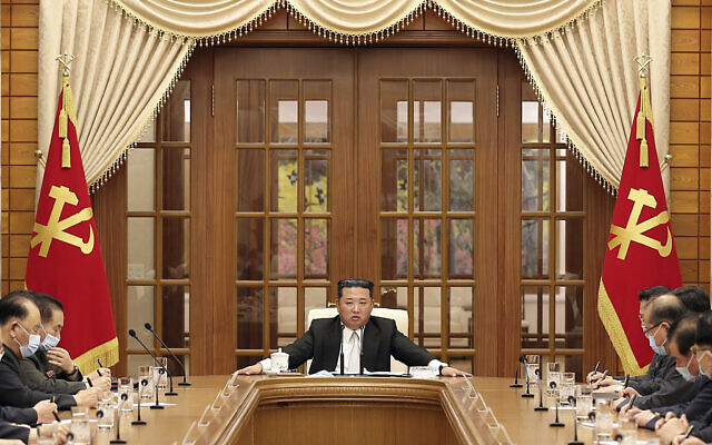 In this photo provided by the North Korean government, North Korean leader Kim Jong Un, center, attends a meeting of the Central Committee of the ruling Workers' Party in Pyongyang, North Korea Thursday, May 12, 2022. Independent journalists were not given access to cover the event depicted in this image distributed by the North Korean government. The content of this image is as provided and cannot be independently verified. (Korean Central News Agency/Korea News Service via AP) In this photo provided by the North Korean government, North Korean leader Kim Jong Un, center, attends a meeting of the Central Committee of the ruling Workers' Party in Pyongyang, North Korea Thursday, May 12, 2022. Independent journalists were not given access to cover the event depicted in this image distributed by the North Korean government. The content of this image is as provided and cannot be independently verified. (Korean Central News Agency/Korea News Service via AP)