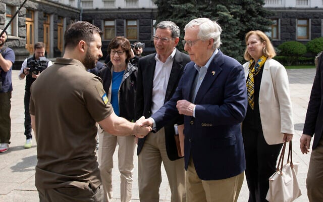 Ukrainian President Volodymyr Zelenskyy, left, shakes hands with Senate Minority Leader Mitch McConnell, a Republican from Kentucky, in Kyiv, Ukraine, May 14, 2022. (Ukrainian Presidential Press Office via AP) Ukrainian President Volodymyr Zelenskyy, left, shakes hands with Senate Minority Leader Mitch McConnell, a Republican from Kentucky, in Kyiv, Ukraine, May 14, 2022. (Ukrainian Presidential Press Office via AP)