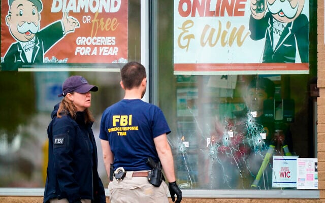 Investigators work the scene of a shooting at a supermarket, in Buffalo, NY, May 16, 2022. (AP Photo/Matt Rourke) Investigators work the scene of a shooting at a supermarket, in Buffalo, NY, May 16, 2022. (AP Photo/Matt Rourke)