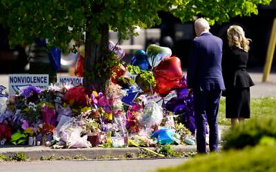 President Joe Biden and first lady Jill Biden visit the scene of a shooting at a supermarket to pay respects and speak to families of the victims of the shooting in Buffalo, New York, May 17, 2022. (Matt Rourke/AP)