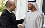 FILE - Israeli Prime Minister Naftali Bennett, left, shakes hands with president of the United Arab Emirates, Sheikh Mohammed bin Zayed Al Nahyan, then crown prince of Abu Dhabi in Abu Dhabi, United Arab Emirates, December 13, 2021. (Haim Zach/Israel Government Press Office via AP, File)