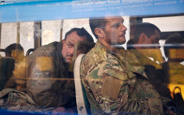 Ukrainian servicemen sit in a bus after they were evacuated from the besieged Mariupol's Azovstal steel plant, near a remand prison in Olyonivka, in territory under the government of the Donetsk People's Republic, eastern Ukraine, May 17, 2022. (Alexei Alexandrov/AP) Ukrainian servicemen sit in a bus after they were evacuated from the besieged Mariupol's Azovstal steel plant, near a remand prison in Olyonivka, in territory under the government of the Donetsk People's Republic, eastern Ukraine, May 17, 2022. (Alexei Alexandrov/AP)