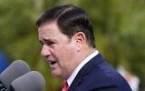 File: Arizona Republican Gov. Doug Ducey speaks at a ceremony on December 7, 2021, in Phoenix. (AP Photo/Ross D. Franklin)