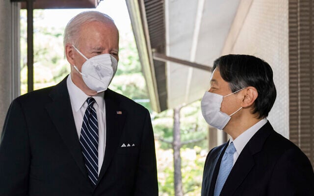 Japan's Emperor Naruhito, right, greets US President Joe Biden prior to a meeting at the Imperial Palace in Tokyo, May 23, 2022. (Saul Loeb/Pool Photo via AP) Japan's Emperor Naruhito, right, greets US President Joe Biden prior to a meeting at the Imperial Palace in Tokyo, May 23, 2022. (Saul Loeb/Pool Photo via AP)