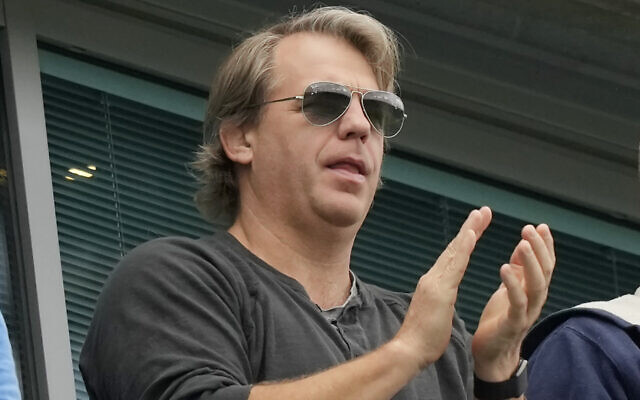 American businessman Todd Boehly applauds during the English Premier League soccer match between Chelsea and Wolverhampton at Stamford Bridge stadium, in London, May 7, 2022. (AP Photo/ Frank Augstein, File)