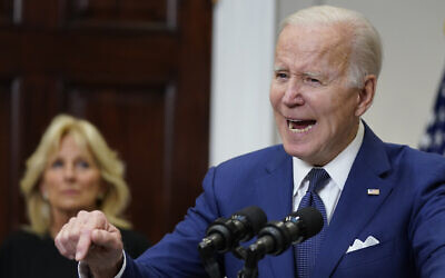 US President Joe Biden speaks about the mass shooting at Robb Elementary School in Uvalde, Texas, from the White House, in Washington, Tuesday, May 24, 2022, as first lady Jill Biden listens. (AP Photo/Manuel Balce Ceneta)