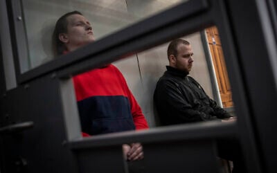 Russian soldiers Alexander Alexeevich Ivanov, right, and Alexander Vladimirovich Bobykin attend their trial hearing in Kotelva, northeastern Ukraine, May 26, 2022. (AP Photo/Bernat Armangue) Russian soldiers Alexander Alexeevich Ivanov, right, and Alexander Vladimirovich Bobykin attend their trial hearing in Kotelva, northeastern Ukraine, May 26, 2022. (AP Photo/Bernat Armangue)