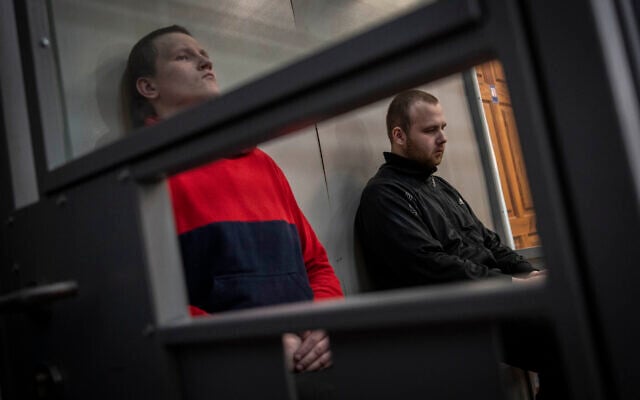Russian soldiers Alexander Alexeevich Ivanov, right, and Alexander Vladimirovich Bobykin attend their trial hearing in Kotelva, northeastern Ukraine, May 26, 2022. (AP Photo/Bernat Armangue) Russian soldiers Alexander Alexeevich Ivanov, right, and Alexander Vladimirovich Bobykin attend their trial hearing in Kotelva, northeastern Ukraine, May 26, 2022. (AP Photo/Bernat Armangue)