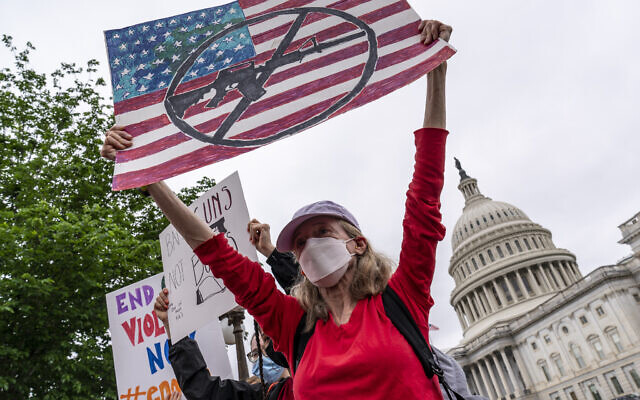 Activists join Senate Democrats outside the Capitol to demand action on gun control legislation after a gunman killed 19 children and two teachers at a Texas elementary school this week, in Washington, Thursday, May 26, 2022. (AP/J. Scott Applewhite) Activists join Senate Democrats outside the Capitol to demand action on gun control legislation after a gunman killed 19 children and two teachers at a Texas elementary school this week, in Washington, Thursday, May 26, 2022. (AP/J. Scott Applewhite)