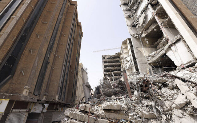 Ruins of a tower at under construction 10-story Metropol Building after it collapsed in the southwestern city of Abadan, Iran, in a photo released May 27, 2022. (Iranian Senior Vice-President Office via AP) Ruins of a tower at under construction 10-story Metropol Building after it collapsed in the southwestern city of Abadan, Iran, in a photo released May 27, 2022. (Iranian Senior Vice-President Office via AP)