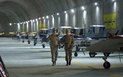 Chief of the General Staff of the Armed Forces Gen. Mohammad Hossein Bagheri (left) and Commander of the Army Gen. Abdolrahim Mousavi visit an underground drone base tunnel belonging to the Iranian military in the heart of the country's western Zagros Mountains, May 28, 2022. (Iranian Army via AP)