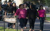 People leave a funeral home after attending a visitation for Amerie Garza, a 10-year-old victim who was killed in last week's elementary school shooting in Uvalde, Texas, Monday, May 30, 2022. (AP Photo/Jae C. Hong)
