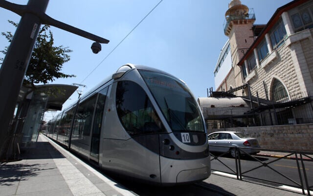An illustrative photo of the Jerusalem light rail passing through Shuafat. (Kobi Gideon/Flash90) An illustrative photo of the Jerusalem light rail passing through Shuafat. (Kobi Gideon/Flash90)