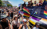 People march during the annual Pride Parade in Haifa, June 18, 2021. (Roni Ofer/Flash90)