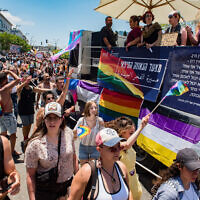 People march during the annual Pride Parade in Haifa, June 18, 2021. (Roni Ofer/Flash90)