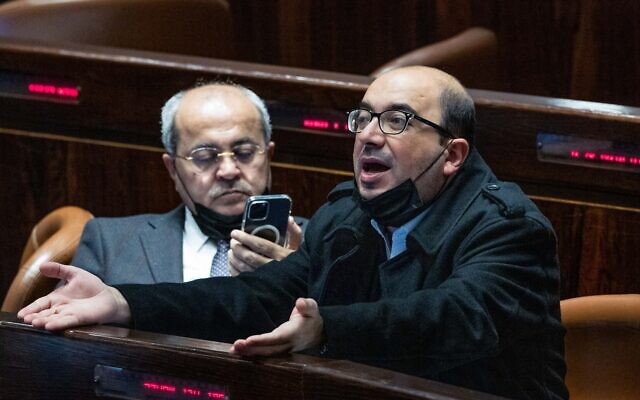 Joint List MKs Sami Abou Shahadeh (right) and Ahmad Tibi seen during a plenum session at the Knesset on February 23, 2022. (Yonatan Sindel/Flash90) Joint List MKs Sami Abou Shahadeh (right) and Ahmad Tibi seen during a plenum session at the Knesset on February 23, 2022. (Yonatan Sindel/Flash90)