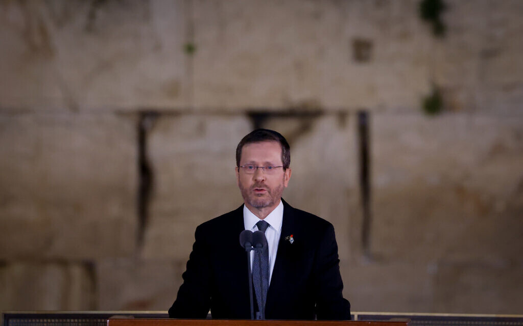 President Isaac Herzog addresses the state ceremony for Israel's Memorial Day for fallen soldiers and terror victims, at Jerusalem's Western Wall, on May 3, 2022. (Olivier Fitoussi/Flash90) President Isaac Herzog addresses the state ceremony for Israel's Memorial Day for fallen soldiers and terror victims, at Jerusalem's Western Wall, on May 3, 2022. (Olivier Fitoussi/Flash90)
