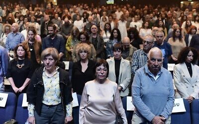 People attend a memorial ceremony commemorating the victims of the decades Israeli-Palestinian conflict in Tel Aviv on May 3, 2022, as Israel marks the annual Memorial Day for fallen soldiers (Tomer Neuberg/Flash90)