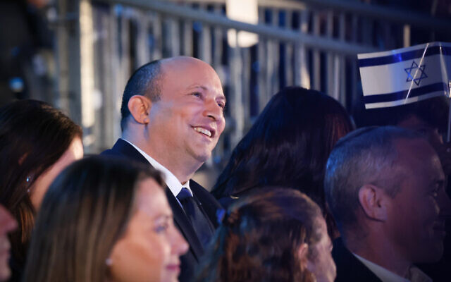 Prime Minister Naftali Bennett enjoys the 74th Independence Day ceremony, held at Mount Herzl, Jerusalem on May 04, 2022 (Yonatan Sindel/Flash90)