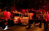 Medics at the scene of a suspected terror attack in Elad, on May 5, 2022. (Jamal Awad/Flash90)