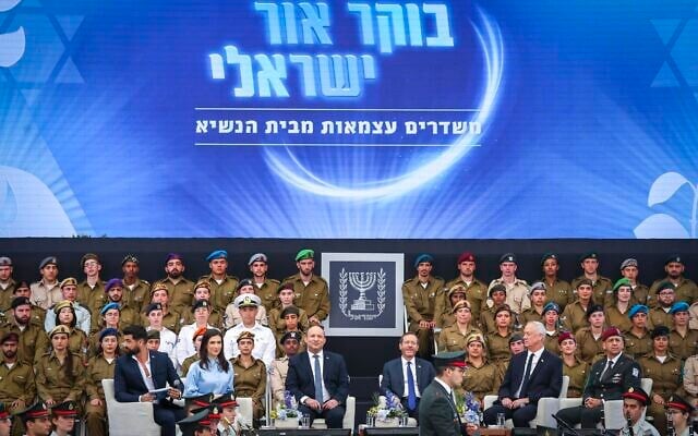 President Isaac Herzog, Prime Minister Naftali Bennett, Minister of Defense Benny Gantz and IDF Chief of Staff Aviv Kochavi attend an event for outstanding soldiers, as part of Israel's 74th Independence Day celebrations, at the President's Residence in Jerusalem on May 5, 2022. (Yonatan Sindel/Flash90) President Isaac Herzog, Prime Minister Naftali Bennett, Minister of Defense Benny Gantz and IDF Chief of Staff Aviv Kochavi attend an event for outstanding soldiers, as part of Israel's 74th Independence Day celebrations, at the President's Residence in Jerusalem on May 5, 2022. (Yonatan Sindel/Flash90)