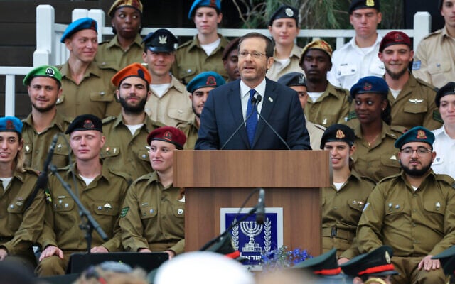 President Isaac Herzog speaks during an event for outstanding soldiers as part of Israel's 74th Independence Day celebrations, at the President's Residence in Jerusalem, on May 5, 2022. (Yonatan Sindel/Flash90) President Isaac Herzog speaks during an event for outstanding soldiers as part of Israel's 74th Independence Day celebrations, at the President's Residence in Jerusalem, on May 5, 2022. (Yonatan Sindel/Flash90)