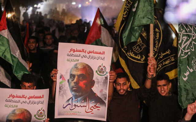 Supporters of Hamas Leader Yahya Sinwar protest outside his home in Khan Yunis, in the southern Gaza Strip, on May 7, 2022. (Attia Muhammed/Flash90) Supporters of Hamas Leader Yahya Sinwar protest outside his home in Khan Yunis, in the southern Gaza Strip, on May 7, 2022. (Attia Muhammed/Flash90)