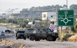 Palestinians clash with Israeli soldiers in the village of Al-Sila Al-Harithi, near the West Bank city of Jenin, May 7, 2022. (Nasser Ishtayeh/Flash90)