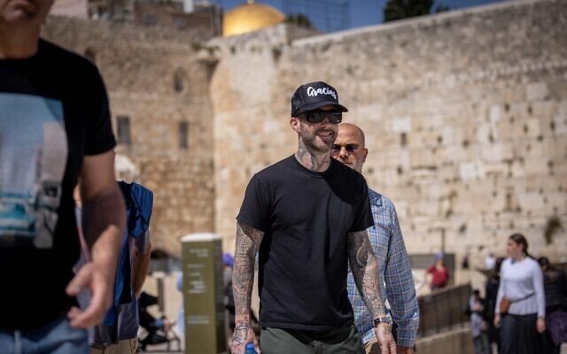 Maroon 5 singer Adam Levine visits the Western Wall in the Old City of Jerusalem on May 8, 2022. (Yonatan Sindel/Flash90) Maroon 5 singer Adam Levine visits the Western Wall in the Old City of Jerusalem on May 8, 2022. (Yonatan Sindel/Flash90)