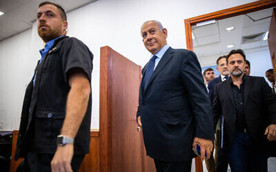 Benjamin Netanyahu arrives for his trial at the District Court in Jerusalem, May 10, 2022 (Oren Ben Hakoon/POOL)